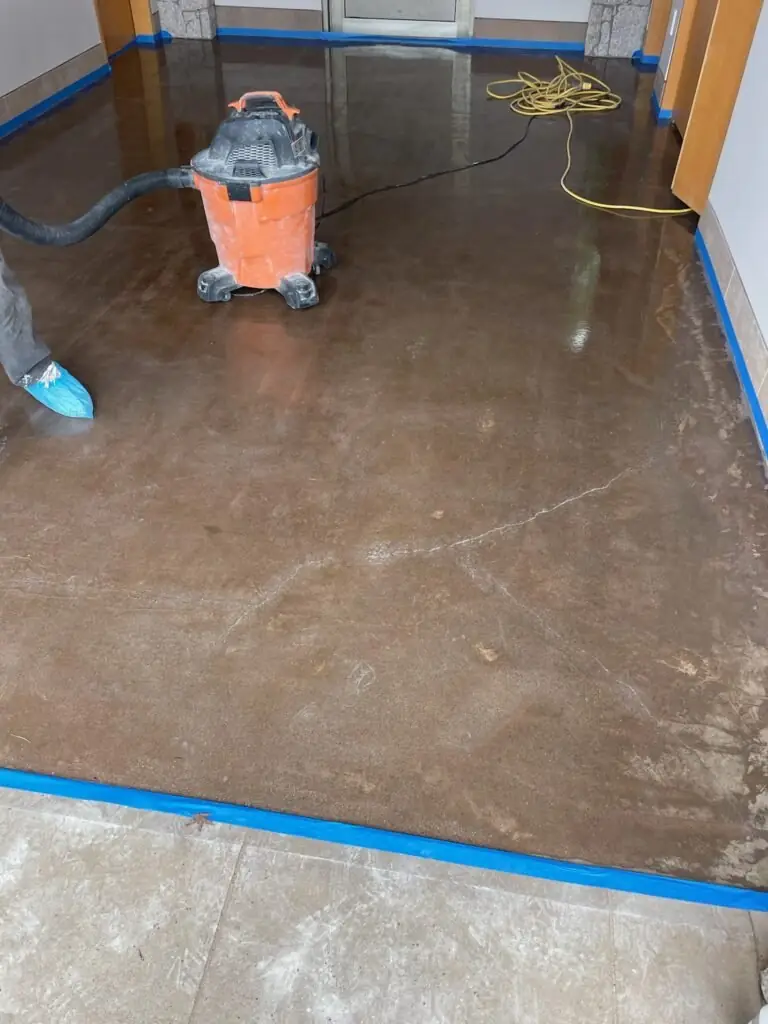 Epoxy coating being installed after floor prep